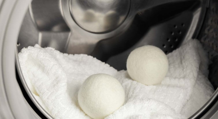 Two wool dryer balls in a tumbler dryer drum—The impact of cold water laundry on dryer ball effectiveness