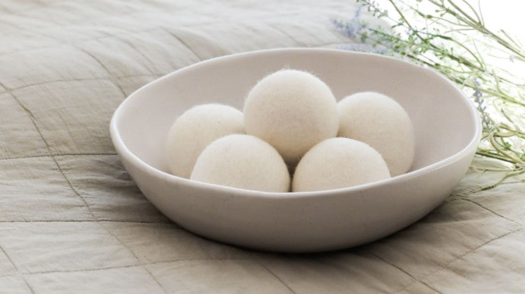 Smart Sheep plan wool dryer balls in a bowl—What can I do with old wool dryer balls?